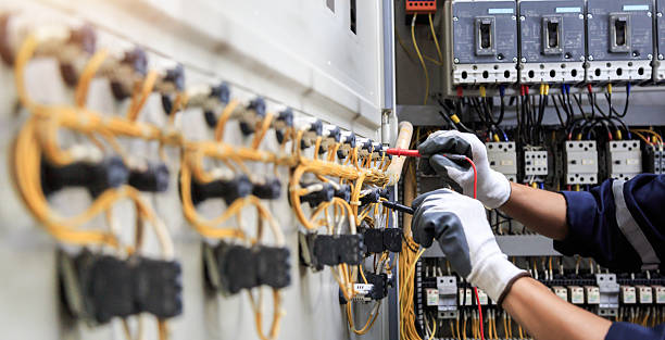 Professional Electrician technician working in Waukee, IA